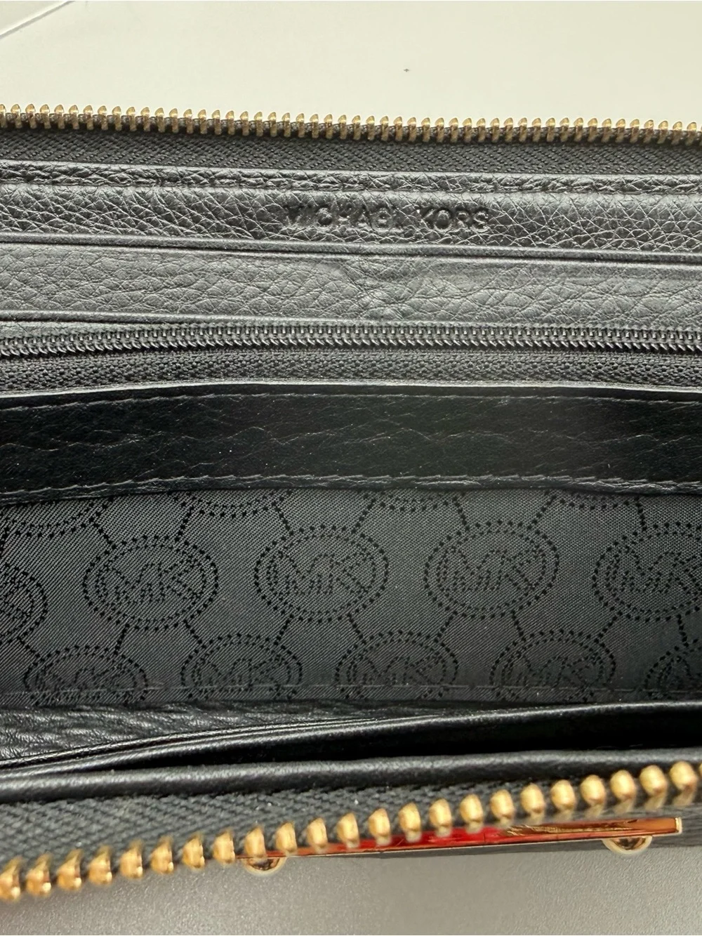 Michael Kors Black Pebbled Leather Zip Around Continental Wallet Logo Plaque